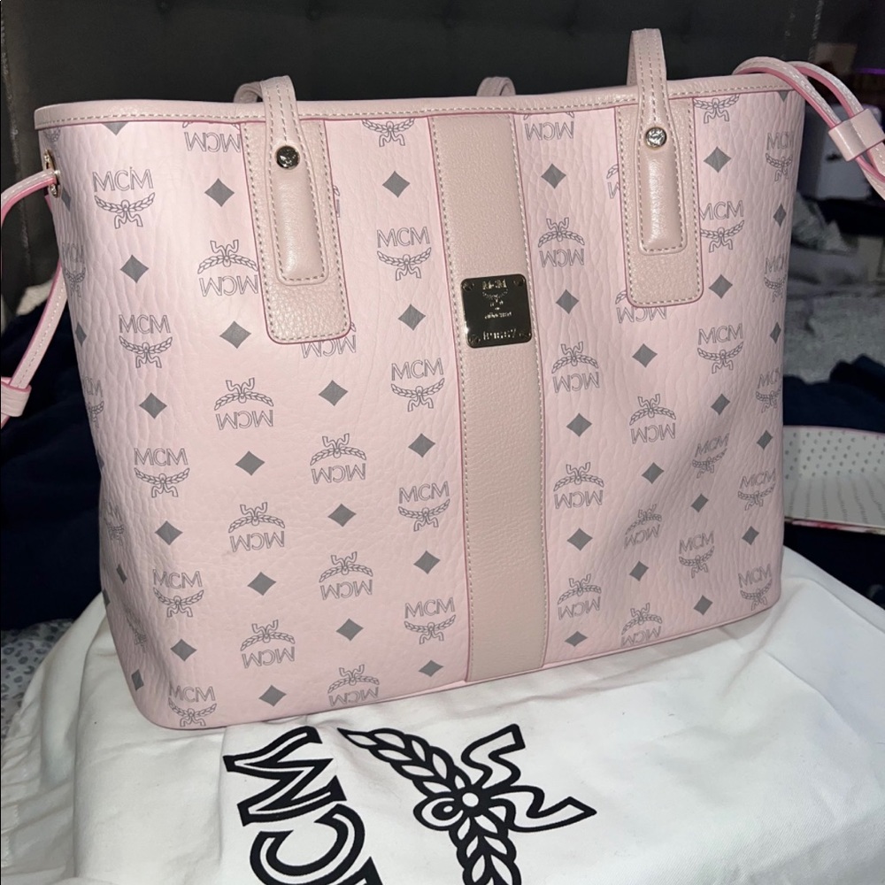 Baby Pink MCM large tote with large pouch inside.